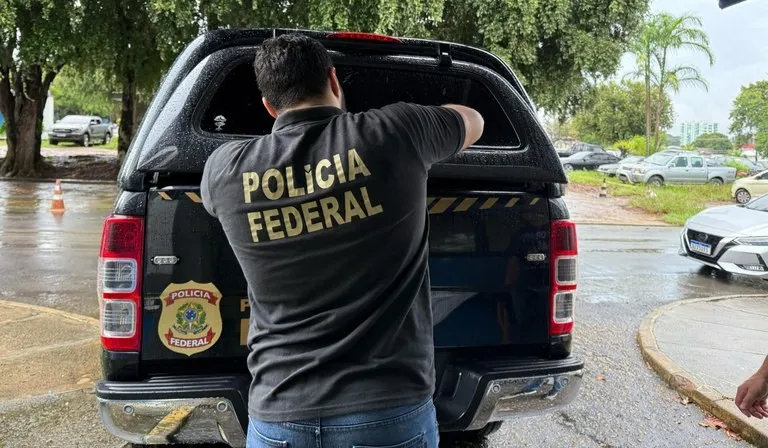 Mulher foi presa pela Polícia Federal durante saque de benefício previdenciário irregular em Campo Grande (Foto: divulgação / Polícia Federal)
